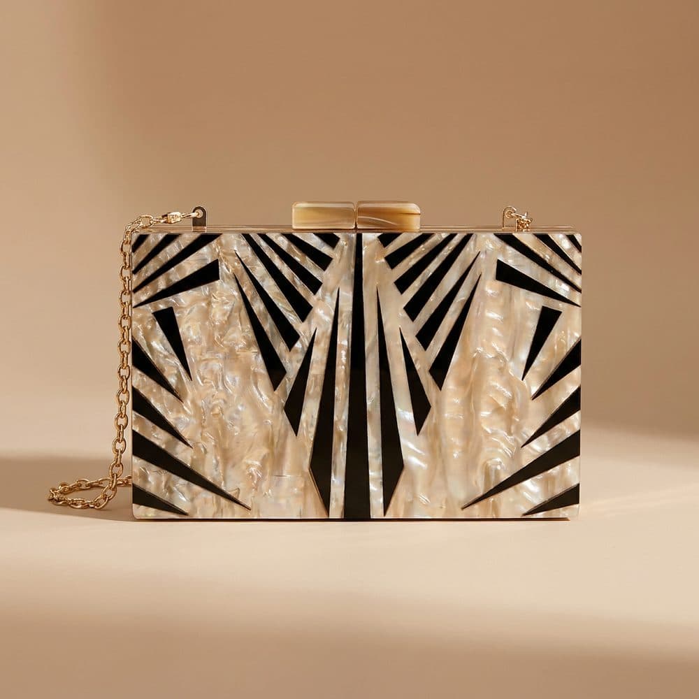 Clutch à motif — pochette de soirée beige à motifs noirs